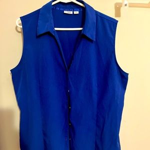 Worn sleeveless button down dress shirt navy blue no rips stains or tears